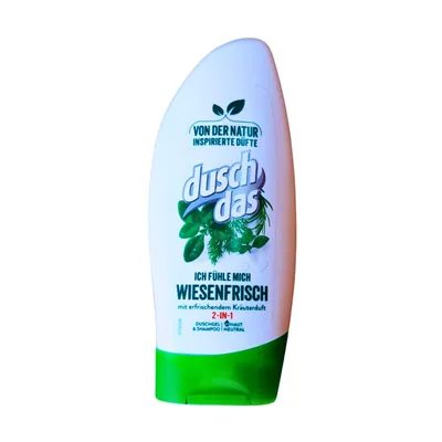 Duschdas Meadowfresh in white plastic bottle and green writing and leaves picture.