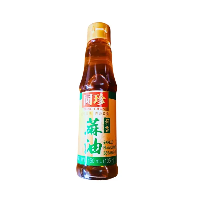 Sesame oil Tung Chun brand in slim, glass bottle with green and beige label.