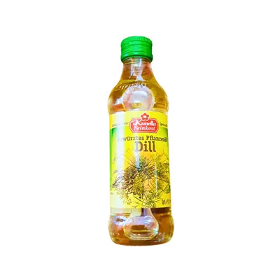 Kunella Dill Oil in a small bottle with green bottlecap.