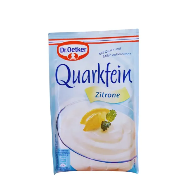 Quarkfein Lemon powder flavouring in light blue sachet with picture of white yoghurt with lemon wedges.