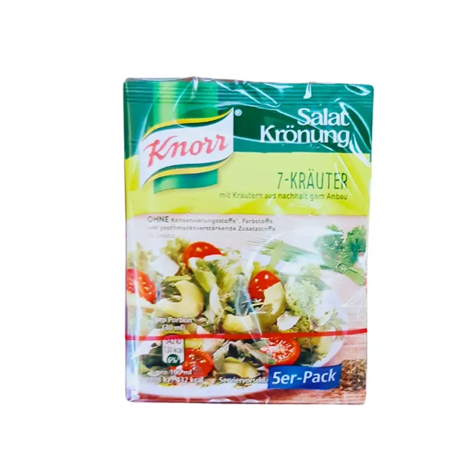Knorr 7-Herbs Dressing in green sachet with picture of salad topped with avocado and salad drizzle.